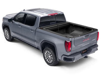 Load image into Gallery viewer, Roll-N-Lock 09-18 RAM 1500 / 10-22 RAM 2500-3500 (76.3in. Bed Length) A-Series XT Retractable Cover