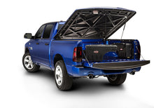 Load image into Gallery viewer, UnderCover 99-16 Ford F-250/F-350 Drivers Side Swing Case - Black Smooth