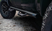 Load image into Gallery viewer, Lund 10-17 Dodge Ram 2500 Crew Cab Terrain HX Step Nerf Bars - Black