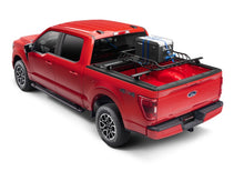 Load image into Gallery viewer, Roll-N-Lock 17-22 Ford Super Duty (81.9in. Bed Length) M-Series XT Retractable Tonneau Cover