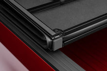 Load image into Gallery viewer, Lund 21-22 Ford F-150 (5.5ft. Bed) Hard Fold Tonneau Cover - Black