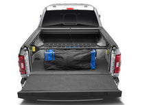 Load image into Gallery viewer, Roll-N-Lock 15-18 Ford F-150 SB 77-3/8in Cargo Manager