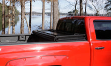 Load image into Gallery viewer, Lund 21-22 Ford F-150 (5.5ft. Bed) Hard Fold Tonneau Cover - Black