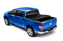 Load image into Gallery viewer, Lund 02-17 Dodge Ram 1500 (5.5ft. Bed) Genesis Elite Tri-Fold Tonneau Cover - Black