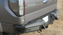 Load image into Gallery viewer, Addictive Desert Designs 10-14 Ford F-150 Raptor HoneyBadger Rear Bumper w/ Tow Hooks