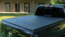 Load image into Gallery viewer, Lund 99-17 Ford F-250 Super Duty (6.5ft. Bed) Genesis Tri-Fold Tonneau Cover - Black