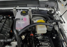 Load image into Gallery viewer, J&amp;L 18-23 Jeep Wrangler JL 3.6L Driver Side Oil Separator 3.0 - Clear Anodized