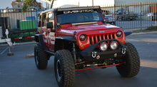 Load image into Gallery viewer, DV8 Offroad 07-18 Jeep Wrangler JK Over Windshield 50in Light Bar Mount - Black Steel