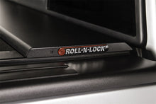 Load image into Gallery viewer, Roll-N-Lock 09-14 Ford F-150 XSB 67in M-Series Retractable Tonneau Cover