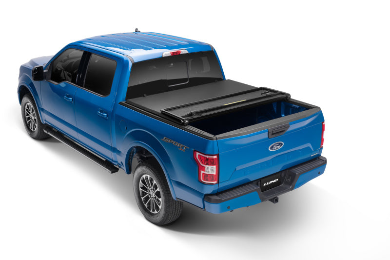 Lund 02-17 Dodge Ram 1500 Fleetside (6.4ft. Bed) Hard Fold Tonneau Cover - Black